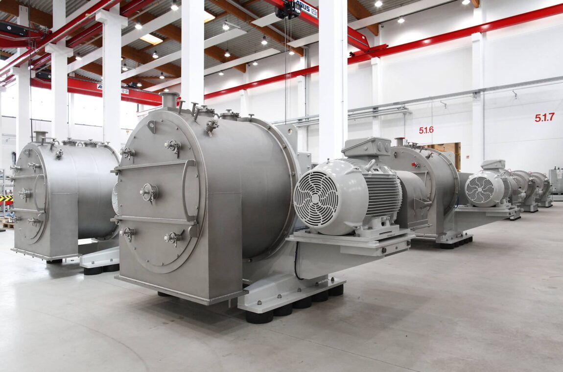 SIEBTECHNIK sieve screw centrifuge CONTURBEX H700 for lactose - hall view in production - 8 machines