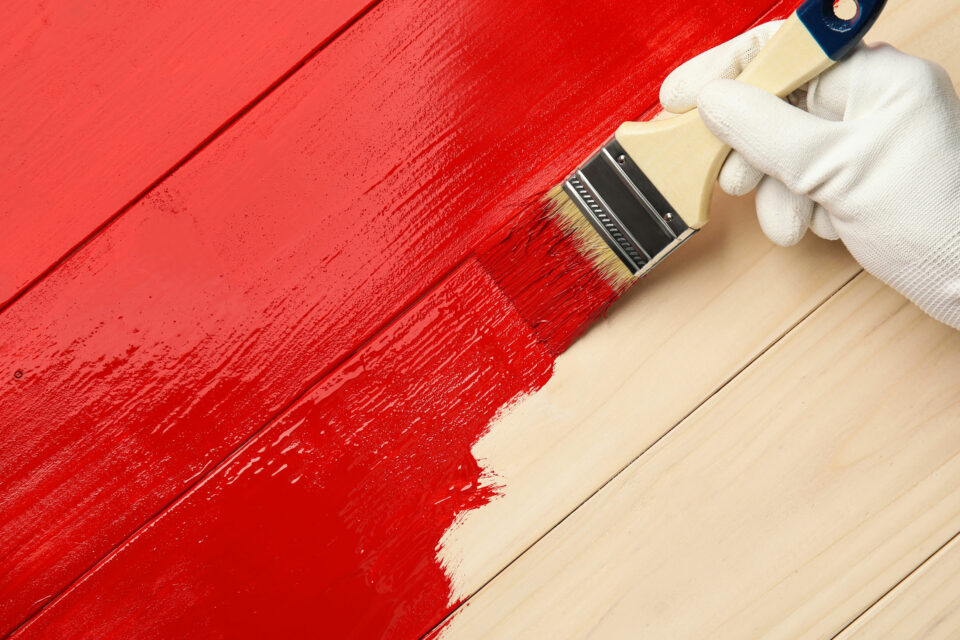 Wood is painted with red lacquer paint